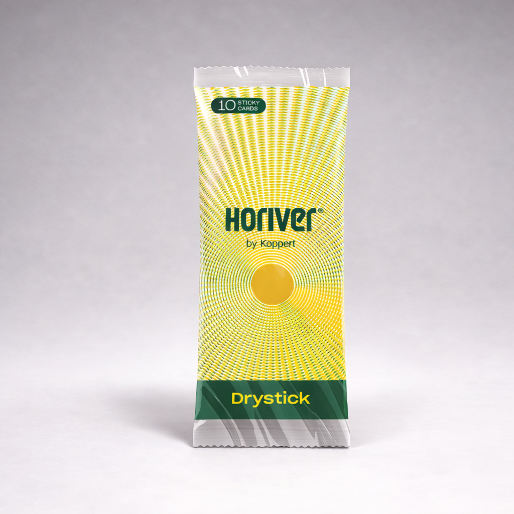 A sealed Horiver Professional Sticky Traps package—pesticide-free with a yellow, circular radiating front design and green/black text—is shown upright against a plain gray background.