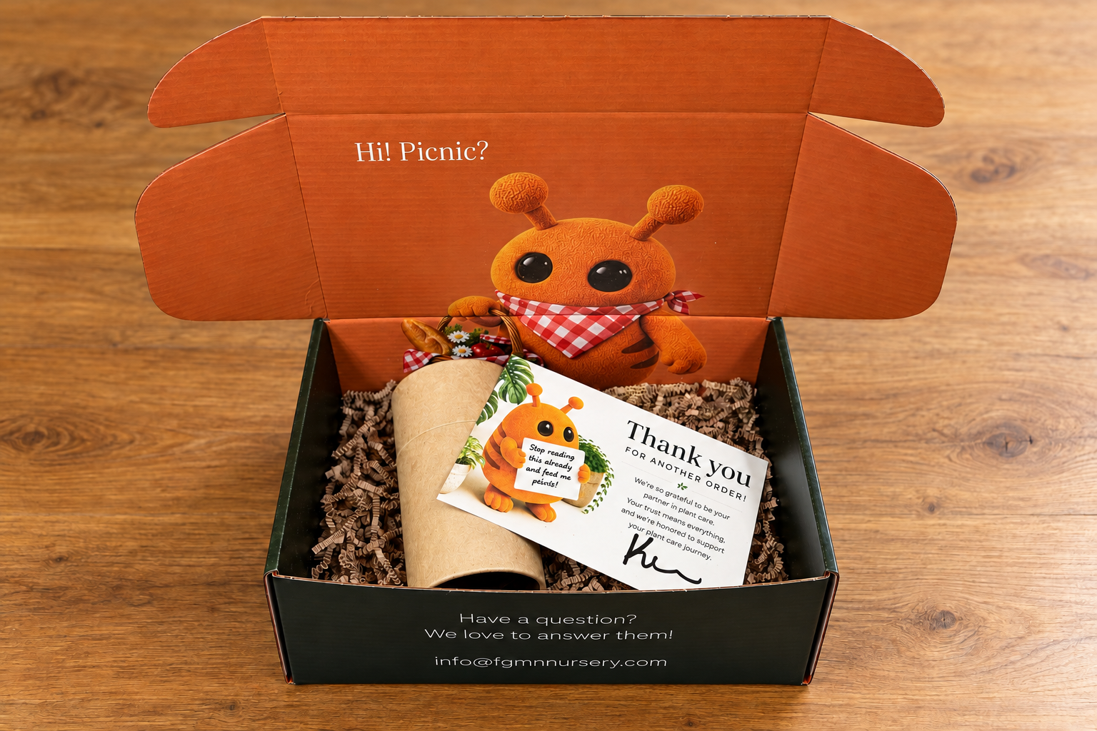 FGMN orange-and-dark-green box with Benny artwork, kraft tube, crinkle paper and thank-you card; AI-retouched from actual packaging photos.