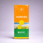 A rectangular yellow, orange, and green package labeled Horiver Professional Sticky Traps by KOPPERT stands upright against a neutral background, featuring a circular logo and field image to promote pesticide-free Integrated Pest Management.