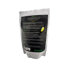 A silver and white resealable Koppert bag stands upright, displaying the back with instructions for using Green Lacewing Eggs in biological pest control, caution statements, and a small image of a yellow-green capsule containing the eggs.