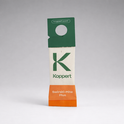 A small paper sachet labeled “Amblyseius Swirskii Prevention Sachets” with a green top, orange bottom, and koppert.com stands upright against a plain gray background. The sachet features a hanging hole for easy use in thrips control.