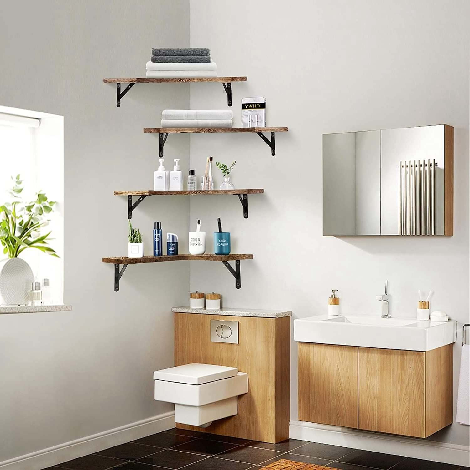 Rustic bathroom with floating corner shelves displaying towels, toiletries, and plants, enhancing space efficiency and decor.